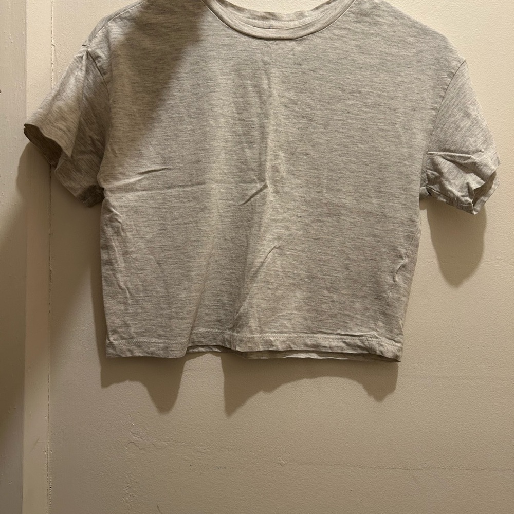 tan cropped juniors shirt